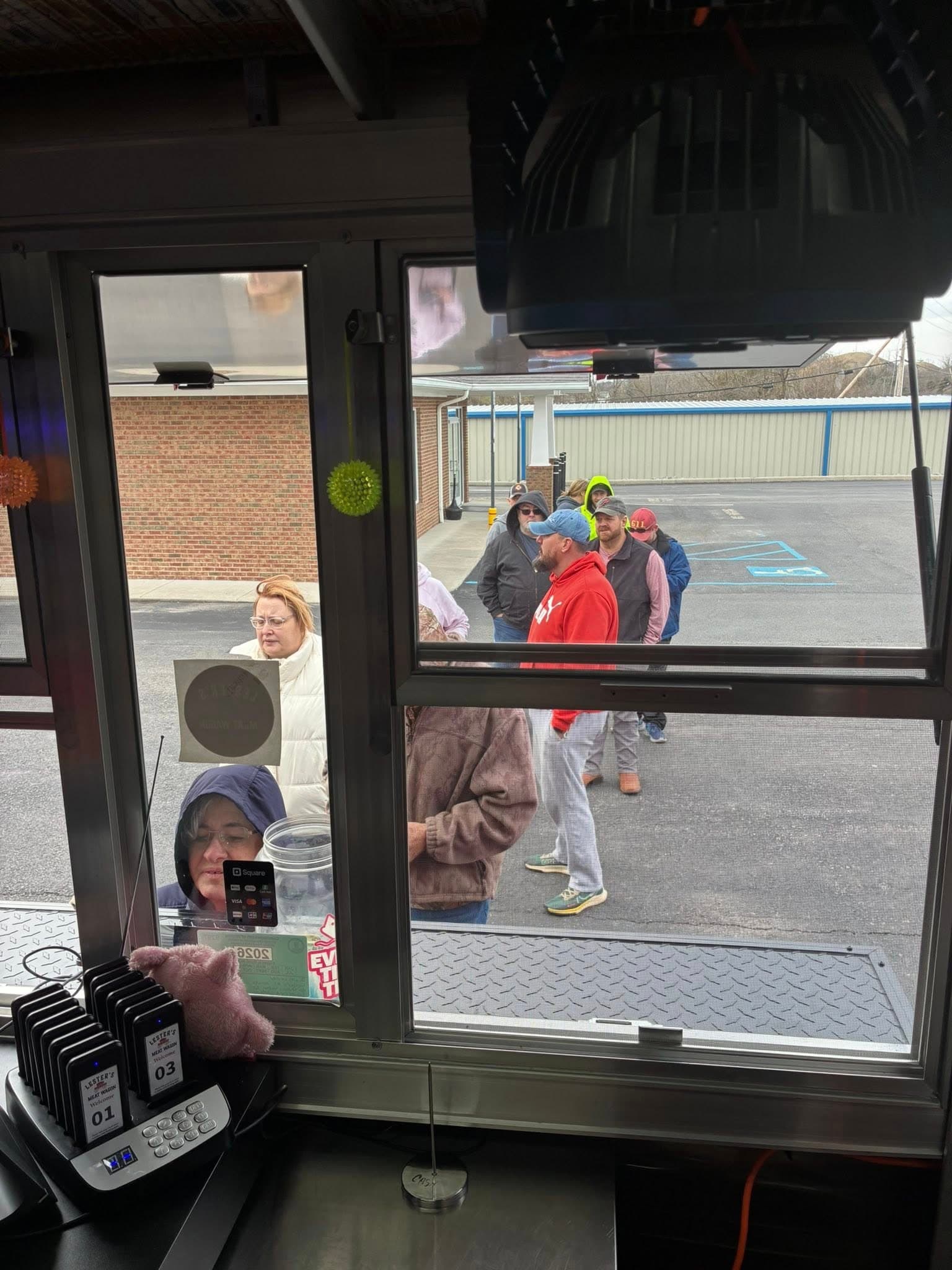 Line of customers outside Lester's Meat Wagon food truck